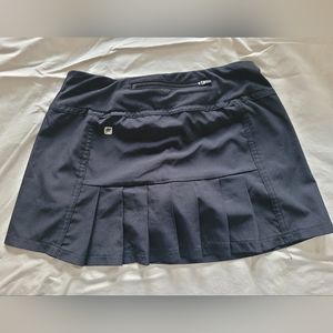 Like New Fabletics XS Black skort with cute pleats at the back.